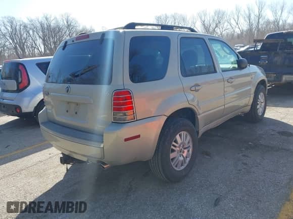 2005 Mercury Mariner Luxury z VIN 4M2YU56125DJ05993, wystawiony jako IAAI lot #41745773 z przebiegiem 265 895 mil mil oraz . Historia ofert i sprzedaży dostępna na DreamBid. Obrazek 4.