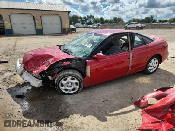 ✅ 2001 Saturn SC • VIN: 1G8ZY12771Z327700 • Лот: 69036975. Опубликован ранее на Copart с пробегом Не указан. Бесплатный доступ к архиву аукционных продаж из США и подробный отчёт об истории автомобиля на DreamBid. Изображение 1.