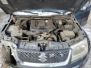 ✅ 2007 Suzuki Grand Vitara Luxury • VIN: JS3TD947574202205 • Лот: 43451705. Опубликован ранее на Copart с пробегом 120 230 миль. Бесплатный доступ к архиву аукционных продаж из США и подробный отчёт об истории автомобиля на DreamBid. Изображение 14.