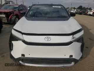 ✅ 2023 Toyota bZ4X XLE • VIN: JTMABACA8PA030764 • Lot: 92645665. Listed on Copart with 12,250 mi. Free auction sales archive from the USA and detailed vehicle history report at DreamBid. Image 5.