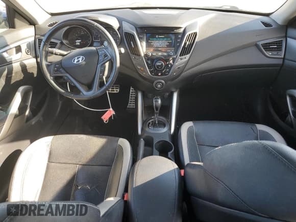 ✅ 2014 Hyundai Veloster Turbo • VIN: KMHTC6AE0EU209218 • Lot: 83717664. Wystawiony na Copart z przebiegiem 119 646 mil. Bezpłatny archiwum sprzedaży aukcyjnych z USA i szczegółowy raport historii pojazdu na DreamBid. Zdjęcie 8.