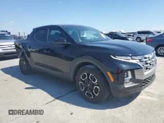 2022 Hyundai Santa Cruz SE z VIN 5NTJA4AE4NH039558, wystawiony jako Copart lot #74379164 z przebiegiem 18 324 mil mil oraz Szkoda całkowita • Salvage title. Historia ofert i sprzedaży dostępna na DreamBid. Obrazek 4.