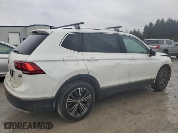 ✅ 2018 Volkswagen Tiguan SEL • VIN: 3VV2B7AX5JM012930 • Lot: 92529245. Listed on Copart with 109,777 mi. Free auction sales archive from the USA and detailed vehicle history report at DreamBid. Image 3.