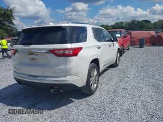 2018 Chevrolet Traverse High Country z VIN 1GNEVKKW8JJ269807, wystawiony jako IAAI lot #43320195 z przebiegiem 126 490 mil mil oraz . Historia ofert i sprzedaży dostępna na DreamBid. Obrazek 4.