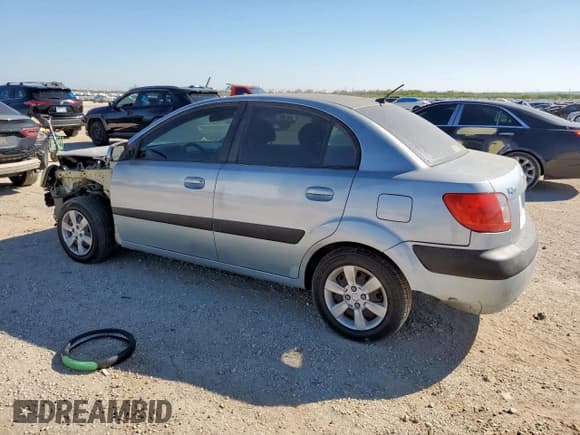 ✅ 2007 Kia Rio LX • VIN: KNADE123176277731 • Lot: 91933635. Listed on Copart with 116,940 mi. Free auction sales archive from the USA and detailed vehicle history report at DreamBid. Image 2.