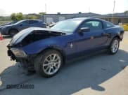 ✅ 2011 Ford Mustang V6 • VIN: 1ZVBP8AM7B5142708 • Lot: 80158205. Listed on Copart with 103,805 mi. Free auction sales archive from the USA and detailed vehicle history report at DreamBid. Image 1.