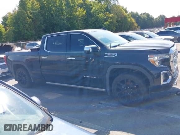 ✅ 2019 GMC Sierra 1500 Denali • VIN: 1GTU9FEL4KZ271400 • Лот: 43233736. Опубликован ранее на IAAI с пробегом 109 716 миль. Бесплатный доступ к архиву аукционных продаж из США и подробный отчёт об истории автомобиля на DreamBid. Изображение 14.