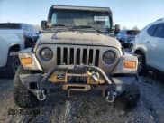 ✅ 2004 Jeep Wrangler Rubicon • VIN: 1J4FA69S94P778836 • Lot: 82884304. Wystawiony na Copart z przebiegiem 168 045 mil. Bezpłatny archiwum sprzedaży aukcyjnych z USA i szczegółowy raport historii pojazdu na DreamBid. Zdjęcie 5.