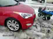 2012 Hyundai Veloster w/Red Int z VIN KMHTC6AD4CU077956, wystawiony jako Copart lot #43504505 z przebiegiem 103 183 mil mil oraz Szkoda całkowita • Salvage title. Historia ofert i sprzedaży dostępna na DreamBid. Obrazek 11.