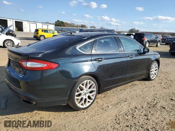 ✅ 2014 Ford Fusion Titanium • VIN: 3FA6P0K91ER149192 • Lot: 92745705. Wystawiony na Copart z przebiegiem 102 478 mil. Bezpłatny archiwum sprzedaży aukcyjnych z USA i szczegółowy raport historii pojazdu na DreamBid. Zdjęcie 3.