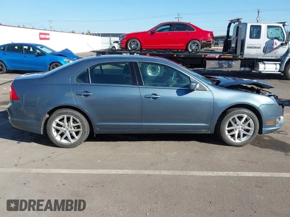 ✅ 2012 Ford Fusion SEL • VIN: 3FAHP0JG0CR332749 • Lot: 43398693. Listed on IAAI with 77,350 mi. Free auction sales archive from the USA and detailed vehicle history report at DreamBid. Image 13.