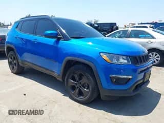 2021 Jeep Compass Latitude with VIN 3C4NJDBB2MT592745, listed as a IAAI auction lot 42966438 with 98,464 mi miles and . Bid and sale history available at DreamBid. Image 1.