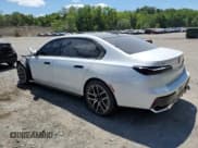 ✅ 2023 BMW i7 xDrive60 • VIN: WBY53EJ04PCL55236 • Lot: 57027815. Listed on Copart with 21,299 mi. Free auction sales archive from the USA and detailed vehicle history report at DreamBid. Image 2.