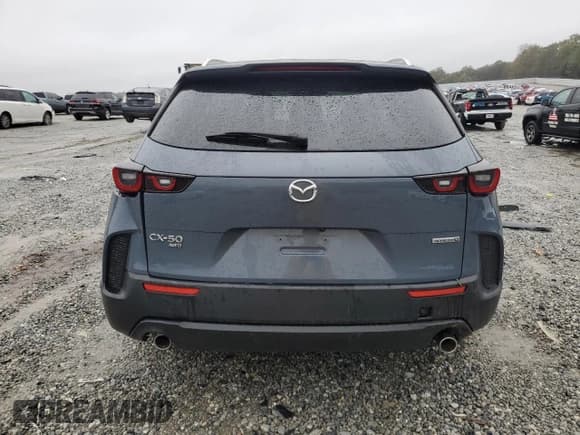 ✅ 2023 Mazda CX-50 S Preferred Plus • VIN: 7MMVABCM9PN112757 • Lot: 90320495. Listed on Copart with 57,072 mi. Free auction sales archive from the USA and detailed vehicle history report at DreamBid. Image 6.