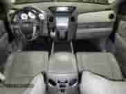 2010 Honda Pilot LX with VIN 5FNYF4H26AB031724, listed as a Copart auction lot 64199905 with 205,743 mi miles and Salvage title. Bid and sale history available at DreamBid. Image 8.