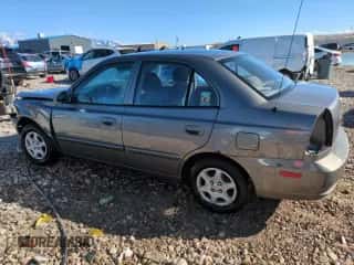 2004 Hyundai Accent GL z VIN KMHCG45C94U523529, wystawiony jako Copart lot #50016085 z przebiegiem 188 120 mil mil oraz Szkoda całkowita • Salvage title. Historia ofert i sprzedaży dostępna na DreamBid. Obrazek 2.