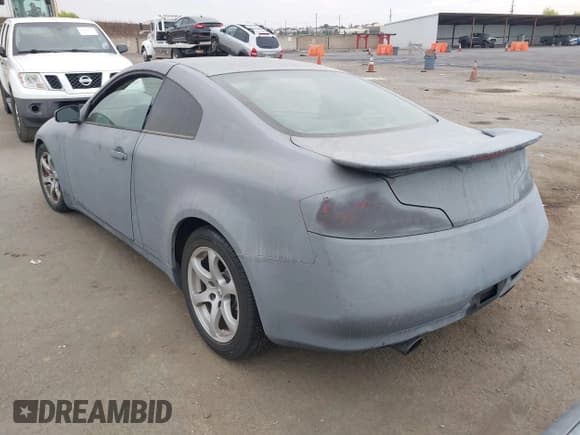 ✅ 2003 Infiniti G35 w/Leather • VIN: JNKCV54E13M205159 • Lot: 43273598. Listed on IAAI with 215,504 mi. Free auction sales archive from the USA and detailed vehicle history report at DreamBid. Image 3.