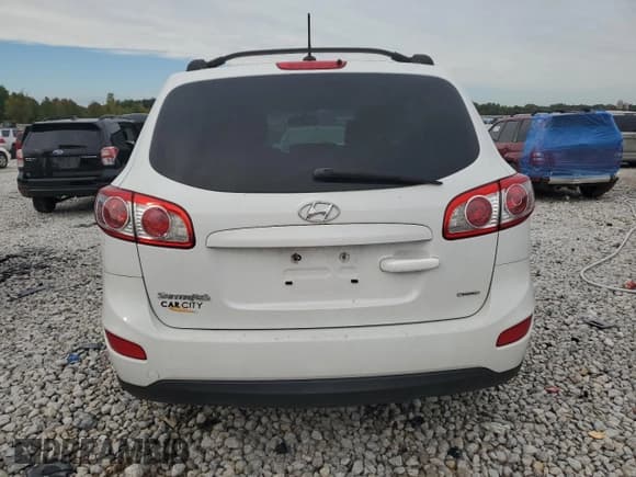 ✅ 2012 Hyundai Santa Fe GLS • VIN: 5XYZGDAB2CG151401 • Lot: 72714994. Listed on Copart with 123,518 mi. Free auction sales archive from the USA and detailed vehicle history report at DreamBid. Image 6.