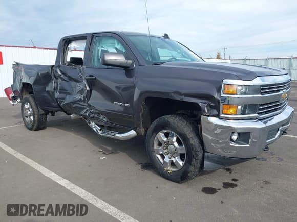 ✅ 2015 Chevrolet Silverado 2500HD LT • VIN: 1GC1KVEG2FF610053 • Lot: 43469299. Listed on IAAI with 173,702 mi. Free auction sales archive from the USA and detailed vehicle history report at DreamBid. Image 1.