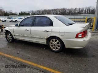 ✅ 2004 Kia Optima LX • VIN: KNAGD128745329120 • Lot: 82915464. Wystawiony na Copart z przebiegiem 167 112 mil. Bezpłatny archiwum sprzedaży aukcyjnych z USA i szczegółowy raport historii pojazdu na DreamBid. Zdjęcie 2.