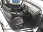 ✅ 2014 Ford Fusion Titanium • VIN: 3FA6P0SU6ER397622 • Lot: 43816342. Listed on IAAI with 121,145 mi. Free auction sales archive from the USA and detailed vehicle history report at DreamBid. Image 5.