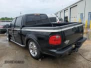 ✅ 2003 Ford F-150 Harley-Davidson • VIN: 1FTRW07333KD41438 • Lot: 54342755. Listed on Copart with 216,391 mi. Free auction sales archive from the USA and detailed vehicle history report at DreamBid. Image 2.