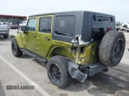 ✅ 2007 Jeep Wrangler Unlimited Sahara • VIN: 1J8GA59167L161894 • Lot: 41856064. Listed on IAAI with 122,714 mi. Free auction sales archive from the USA and detailed vehicle history report at DreamBid. Image 3.