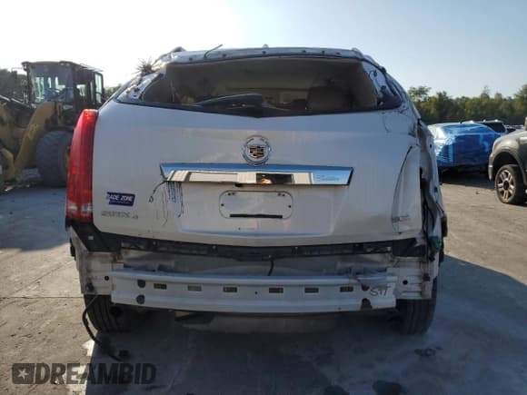 ✅ 2014 Cadillac SRX Performance Collection • VIN: 3GYFNFE30ES518167 • Lot: 80541115. Wystawiony na Copart z przebiegiem Nie podano. Bezpłatny archiwum sprzedaży aukcyjnych z USA i szczegółowy raport historii pojazdu na DreamBid. Zdjęcie 6.