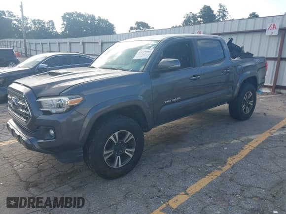 ✅ 2017 Toyota Tacoma SR5 • VIN: 3TMCZ5AN7HM115200 • Lot: 43115086. Listed on IAAI with 117,000 mi. Free auction sales archive from the USA and detailed vehicle history report at DreamBid. Image 2.