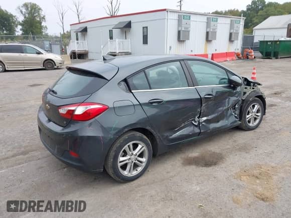 2018 Chevrolet Cruze LT with VIN 3G1BE6SM2JS574129, listed as a IAAI auction lot 43435357 with 114,058 mi miles and . Bid and sale history available at DreamBid. Image 4.