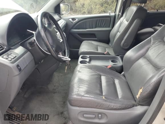 ✅ 2006 Honda Odyssey EX-L • VIN: 5FNRL38656B410666 • Лот: 80554015. Опубликован ранее на Copart с пробегом 243 001 миль. Бесплатный доступ к архиву аукционных продаж из США и подробный отчёт об истории автомобиля на DreamBid. Изображение 7.