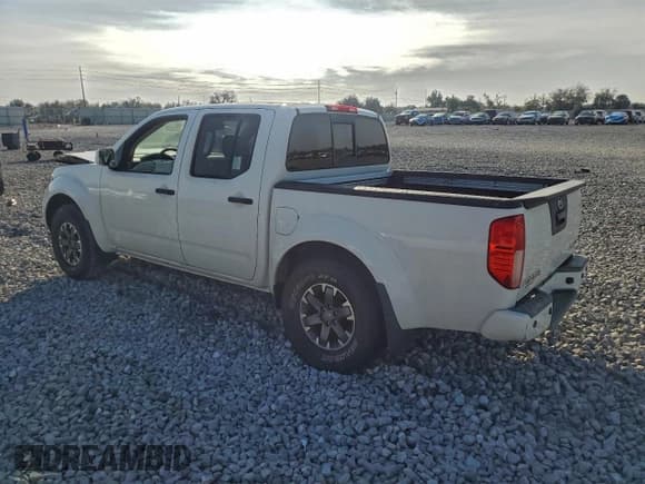 ✅ 2018 Nissan Frontier Pro-4X • VIN: 1N6AD0EV5JN768460 • Lot: 94796935. Listed on Copart with 82,142 mi. Free auction sales archive from the USA and detailed vehicle history report at DreamBid. Image 2.