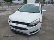 ✅ 2018 Ford Focus SE • VIN: 1FADP3FE0JL331278 • Lot: 43682633. Listed on IAAI with 99,011 mi. Free auction sales archive from the USA and detailed vehicle history report at DreamBid. Image 6.