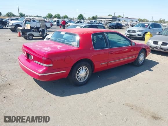 ✅ 1996 Mercury Cougar • VIN: 1MELM6242TH607364 • Lot: 42968383. Listed on IAAI with 130,625 mi. Free auction sales archive from the USA and detailed vehicle history report at DreamBid. Image 4.