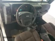 ✅ 2004 Jeep Wrangler Rubicon • VIN: 1J4FA69S14P758371 • Lot: 85557875. Wystawiony na Copart z przebiegiem 144 656 mil. Bezpłatny archiwum sprzedaży aukcyjnych z USA i szczegółowy raport historii pojazdu na DreamBid. Zdjęcie 8.