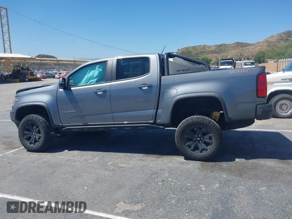 ✅ 2022 Chevrolet Colorado 4WD ZR2 • VIN: 1GCGTEEN3N1309342 • Лот: 41989345. Опубликован ранее на IAAI с пробегом 34 531 миль. Бесплатный доступ к архиву аукционных продаж из США и подробный отчёт об истории автомобиля на DreamBid. Изображение 14.