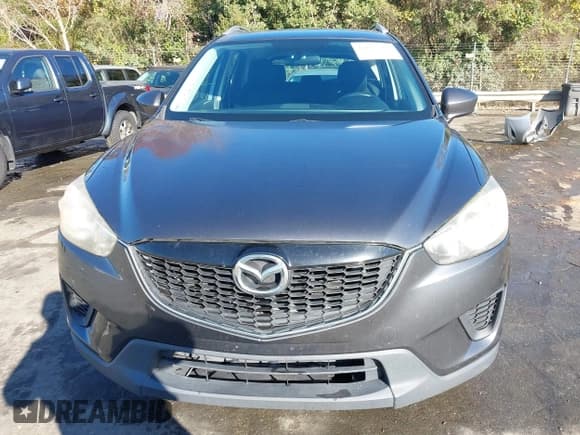 ✅ 2014 Mazda CX-5 Sport • VIN: JM3KE2BE0E0339810 • Lot: 43657362. Listed on IAAI with 198,849 mi. Free auction sales archive from the USA and detailed vehicle history report at DreamBid. Image 12.