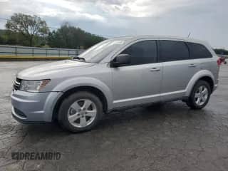 2013 Dodge Journey American Value with VIN 3C4PDCAB2DT502909, listed as a Copart auction lot 81668005 with 124,778 mi miles and Clean title. Bid and sale history available at DreamBid. Image 1.