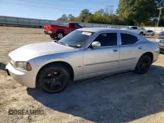 2010 Dodge Charger SXT с VIN 2B3CA3CV7AH285801, выставлен на аукционе Copart как лот 75801874 с пробегом 221 337 миль миль и Списание • Salvage title. История ставок и продаж доступна на DreamBid. Изображение 1.