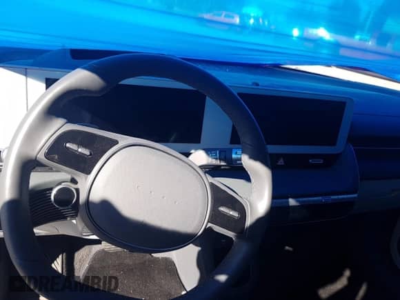 2023 Hyundai Ioniq 5 Limited z VIN KM8KRDAFXPU187903, wystawiony jako Copart lot #63248414 z przebiegiem Nie podano mil oraz Szkoda całkowita • Salvage title. Historia ofert i sprzedaży dostępna na DreamBid. Obrazek 9.