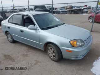2005 Hyundai Accent GLS with VIN KMHCG45C65U576092, listed as a IAAI auction lot 41368504 with 162,208 mi miles and . Bid and sale history available at DreamBid. Image 1.