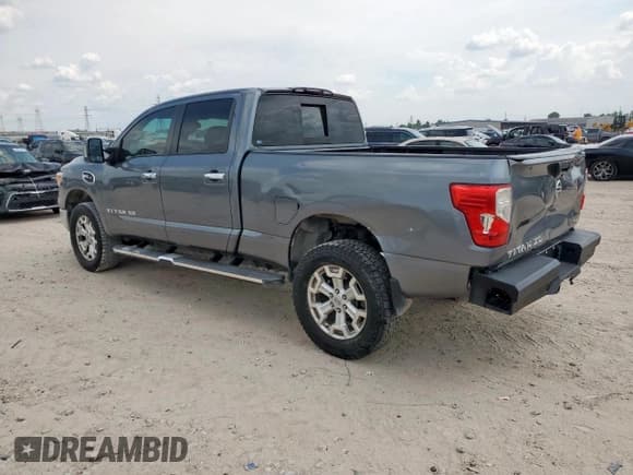 ✅ 2017 Nissan Titan SV • VIN: 1N6AA1F25HN544618 • Лот: 69580255. Опубликован ранее на Copart с пробегом 100 512 миль. Бесплатный доступ к архиву аукционных продаж из США и подробный отчёт об истории автомобиля на DreamBid. Изображение 2.