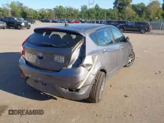 2014 Hyundai Accent SE with VIN KMHCU5AE3EU148146, listed as a IAAI auction lot 43349253 with 123,811 mi miles and . Bid and sale history available at DreamBid. Image 6.