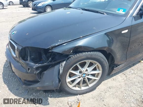 ✅ 2010 BMW 1 Series 128i • VIN: WBAUN1C55AVH81750 • Lot: 42411484. Listed on IAAI with 124,432 mi. Free auction sales archive from the USA and detailed vehicle history report at DreamBid. Image 6.