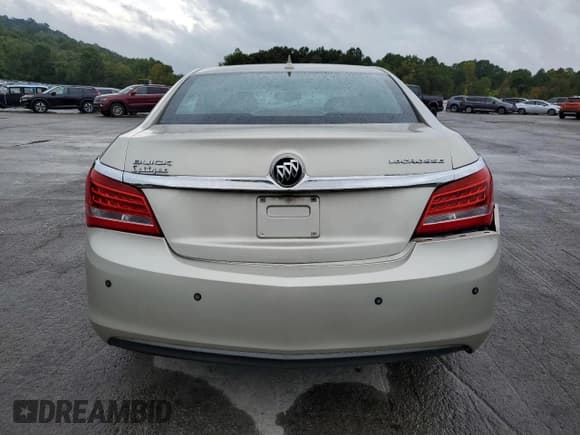 ✅ 2014 Buick LaCrosse • VIN: 1G4GA5GR2EF227705 • Lot: 70598875. Listed on Copart with 111,745 mi. Free auction sales archive from the USA and detailed vehicle history report at DreamBid. Image 6.