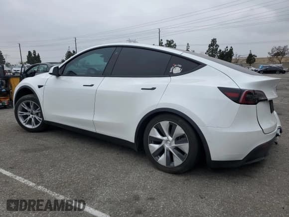 ✅ 2022 Tesla Model Y Long Range • VIN: 7SAYGDEE5NF352075 • Lot: 50799895. Wystawiony na Copart z przebiegiem 11 597 mil. Bezpłatny archiwum sprzedaży aukcyjnych z USA i szczegółowy raport historii pojazdu na DreamBid. Zdjęcie 2.