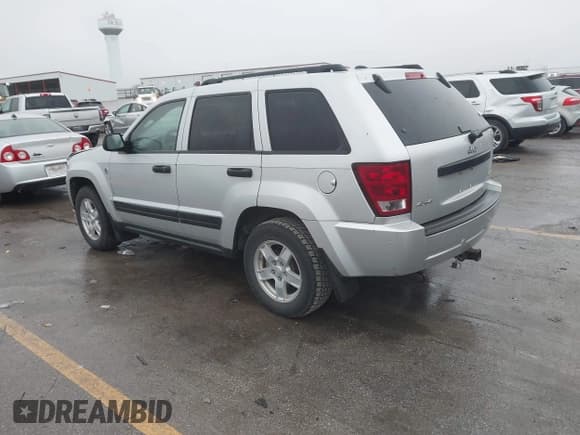 ✅ 2005 Jeep Grand Cherokee Laredo • VIN: 1J4HR48N45C659876 • Lot: 43775770. Listed on IAAI with 103,071 mi. Free auction sales archive from the USA and detailed vehicle history report at DreamBid. Image 3.