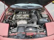 ✅ 1997 Ford Probe • VIN: 1ZVLT20A9V5139608 • Lot: 85340994. Wystawiony na Copart z przebiegiem 174 193 mil. Bezpłatny archiwum sprzedaży aukcyjnych z USA i szczegółowy raport historii pojazdu na DreamBid. Zdjęcie 11.