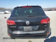 ✅ 2012 Volkswagen Touareg Sport • VIN: WVGEF9BP5CD011457 • Lot: 46785645. Listed on Copart with 108,840 mi. Free auction sales archive from the USA and detailed vehicle history report at DreamBid. Image 6.