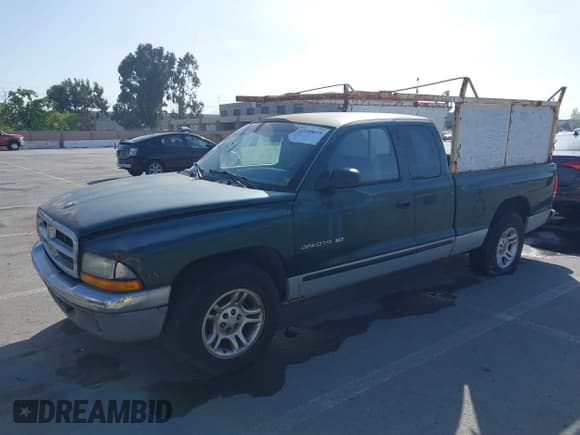 ✅ 2000 Dodge Dakota • VIN: 1B7GL22X2YS648337 • Lot: 42100658. Wystawiony na IAAI z przebiegiem 180 790 mil. Bezpłatny archiwum sprzedaży aukcyjnych z USA i szczegółowy raport historii pojazdu na DreamBid. Zdjęcie 2.